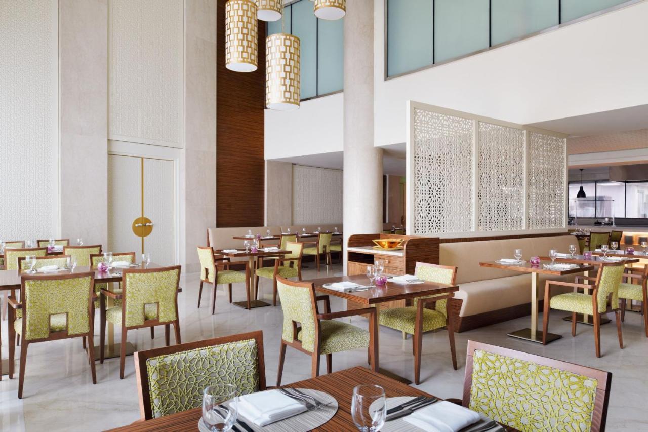 Marriott Executive Apartments อัลโคห์บาร์ ภายนอก รูปภาพ The restaurant